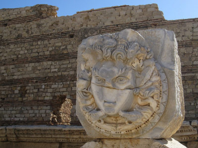 a stone sculpture of a lion