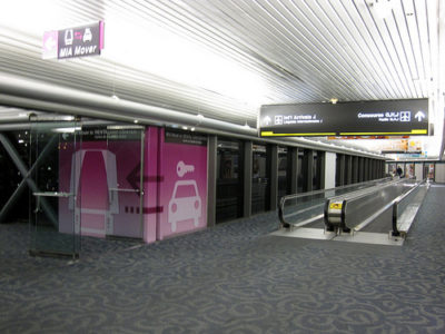 a moving walkway in an airport