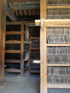 a room with shelves of books