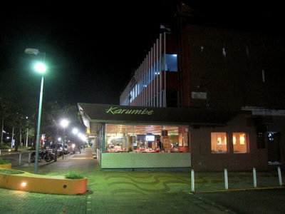 a building with a restaurant in the front