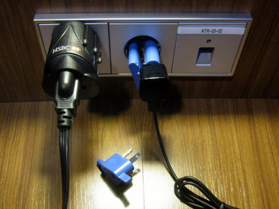 a power plugs plugged into a wall outlet