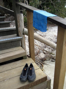 a pair of shoes on a wooden steps
