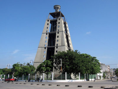 a tall concrete tower with a tower on top