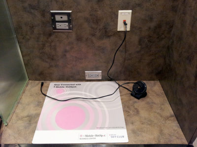 a phone charging station with a plug