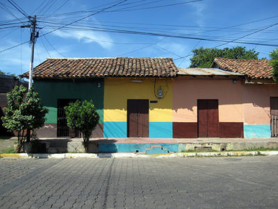 a colorful building with a tile roof