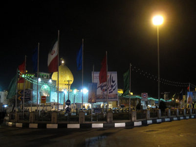 a street with flags and lights