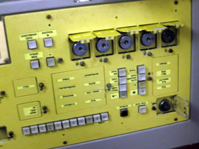 a yellow panel with buttons and switches