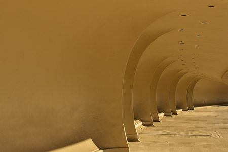 a long corridor with arches