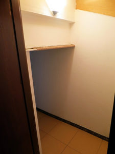 a closet door with a shelf