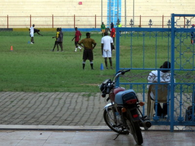 a group of people playing football