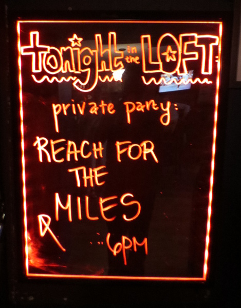 Reach for the Miles Sign