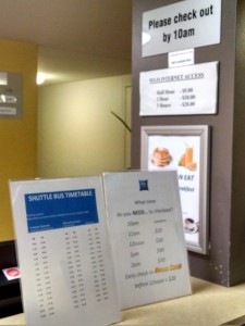 a shuttle bus timetable on a counter